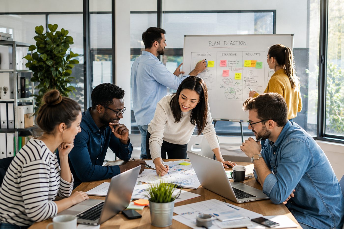 Équipe Teza Solutions en action sur un plan d'action et l'organisation des processus